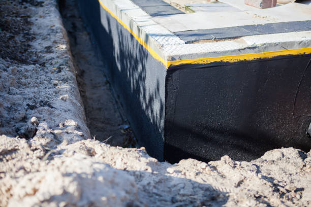 Professional Interior Drainage System technician working in Wolcott, NY